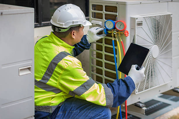 Professional Air Conditioning Repair technician working in Galion, OH